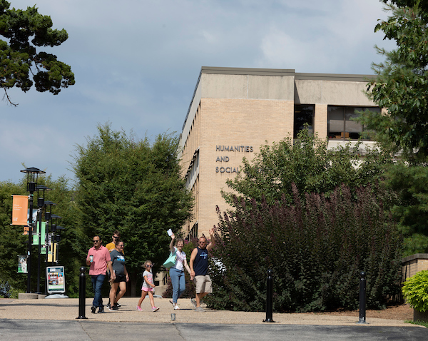 Students and trees outside Humanities building on S&T campus